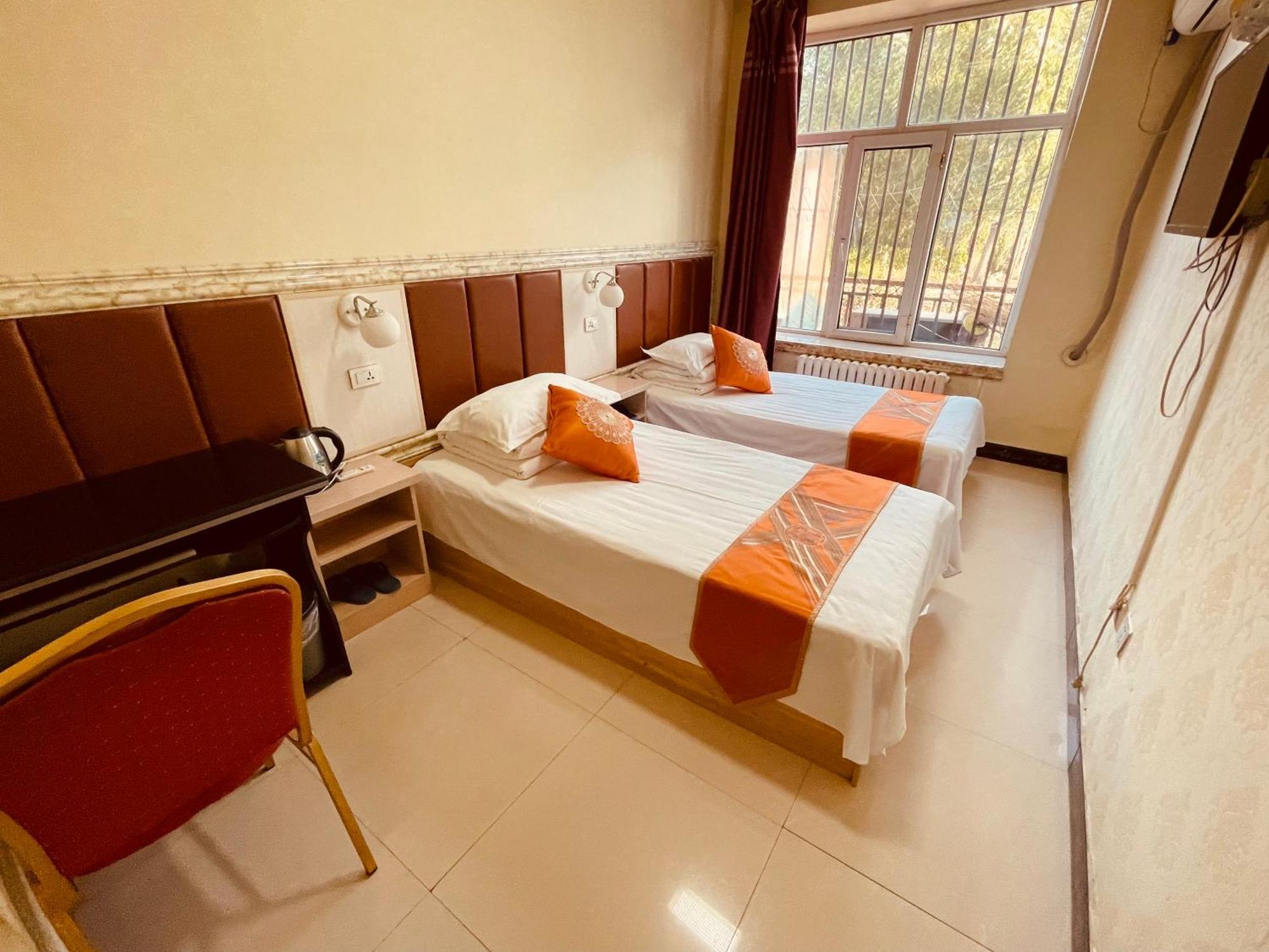 哈尔滨机场东方红运宾馆 Hotel Quarto foto