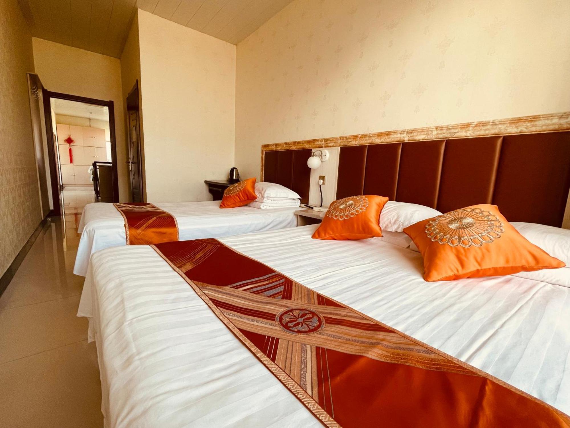 哈尔滨机场东方红运宾馆 Hotel Quarto foto