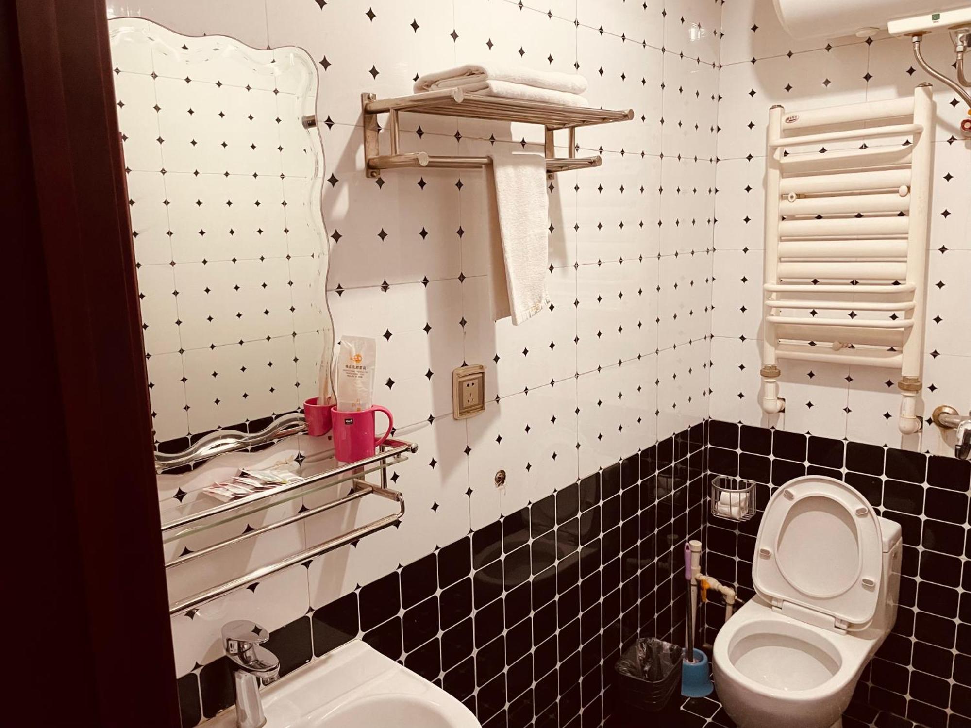 哈尔滨机场东方红运宾馆 Hotel Quarto foto