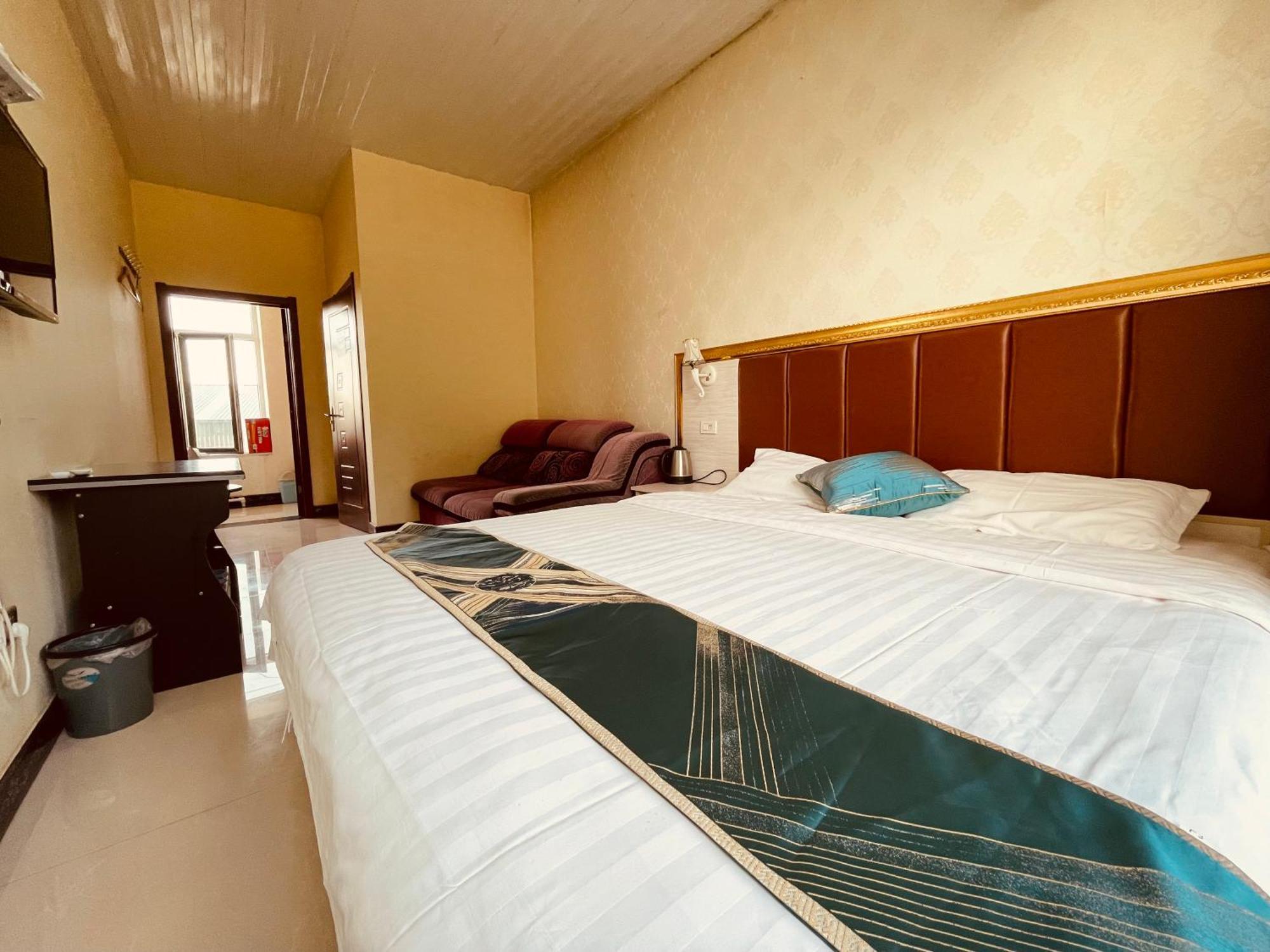 哈尔滨机场东方红运宾馆 Hotel Quarto foto