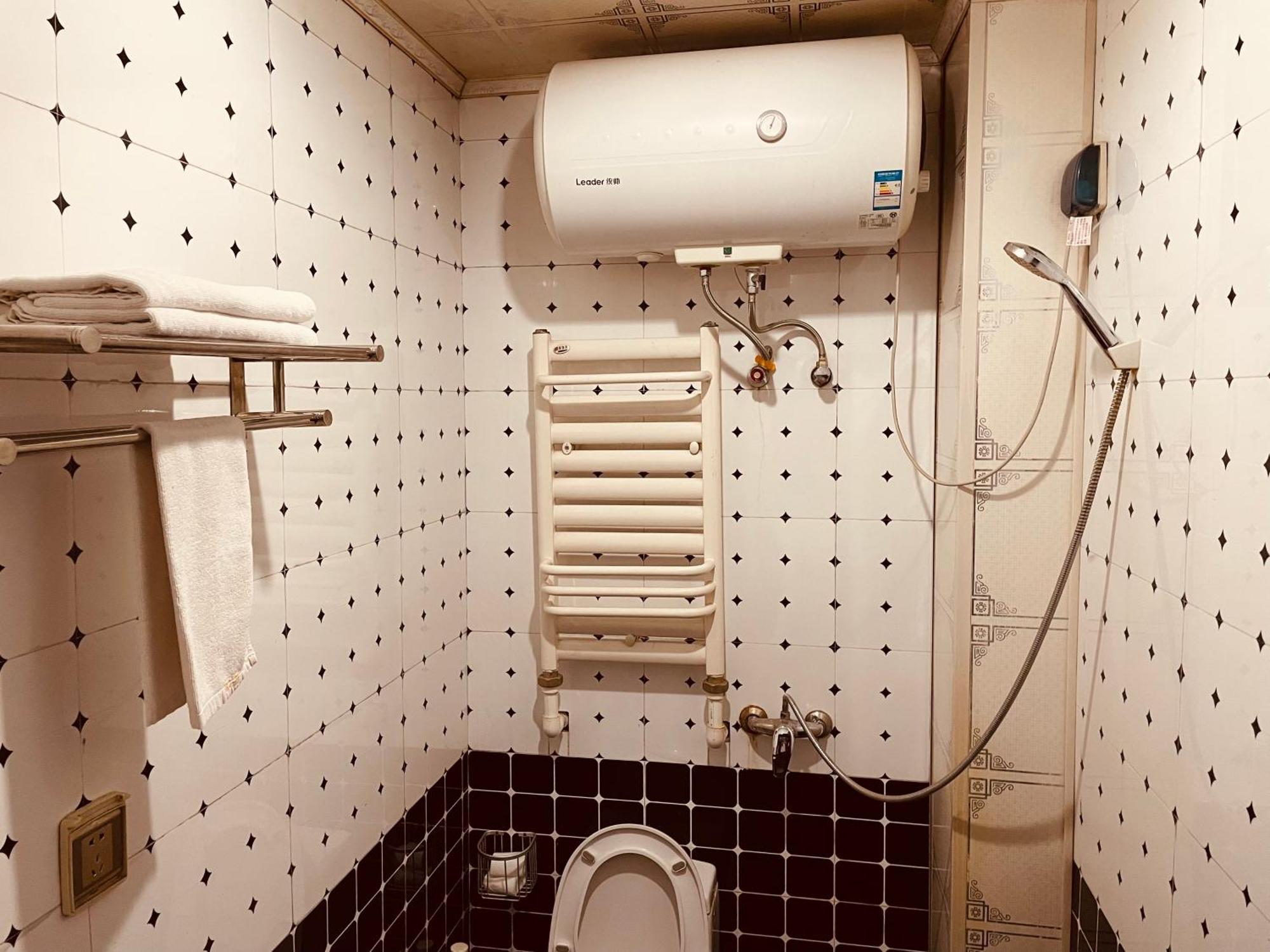 哈尔滨机场东方红运宾馆 Hotel Quarto foto