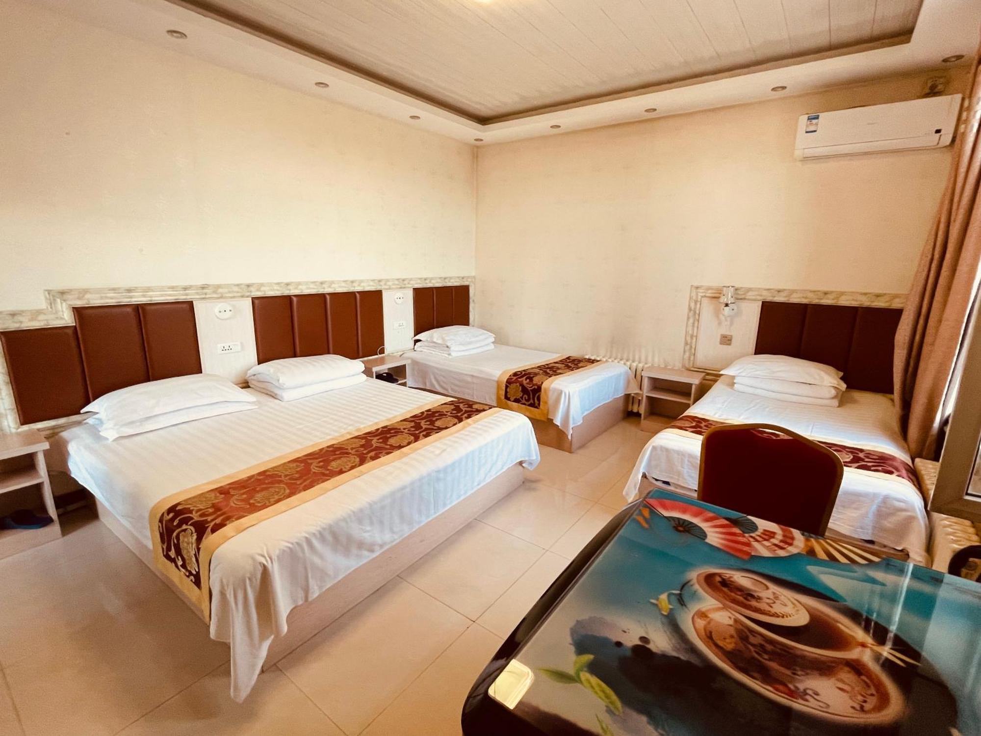 哈尔滨机场东方红运宾馆 Hotel Quarto foto