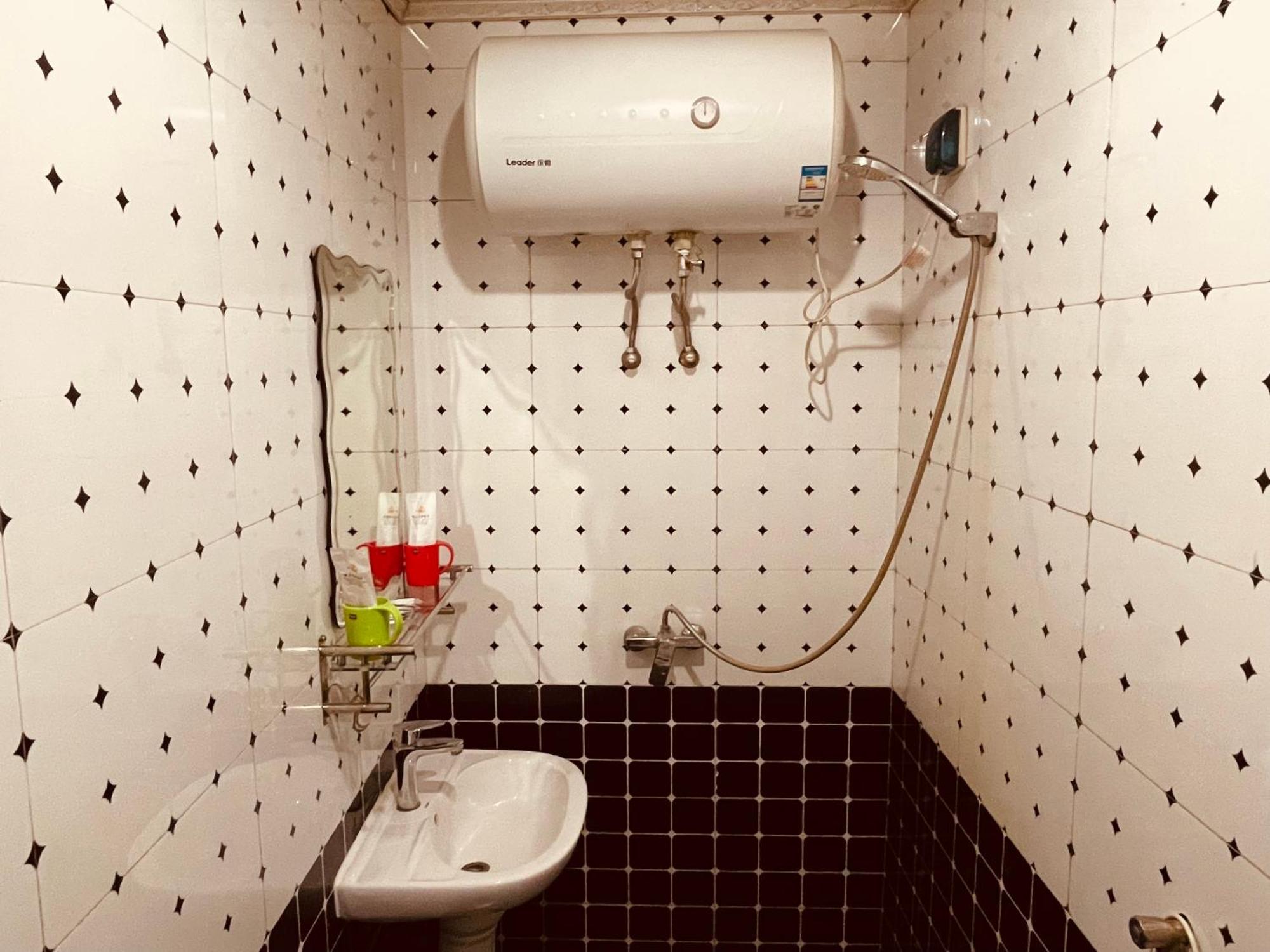 哈尔滨机场东方红运宾馆 Hotel Quarto foto