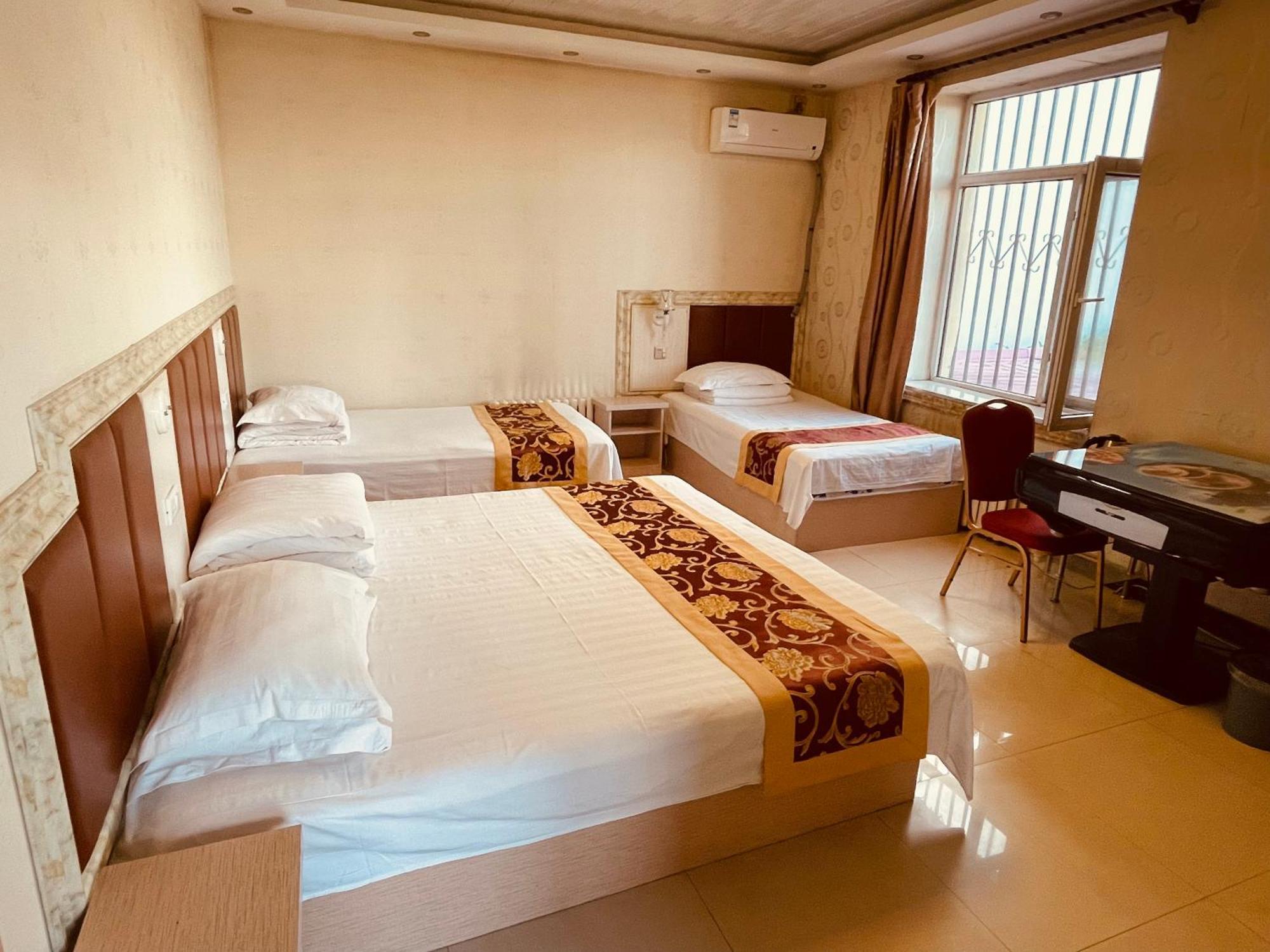 哈尔滨机场东方红运宾馆 Hotel Quarto foto
